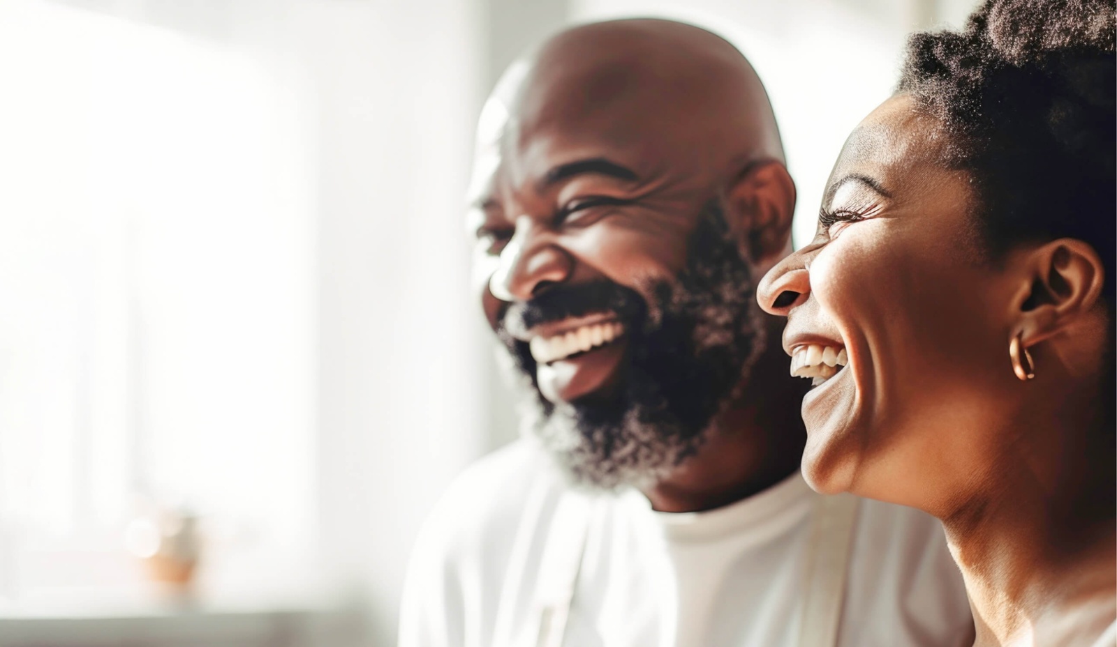 A couple smiling and laughing together (1)-1