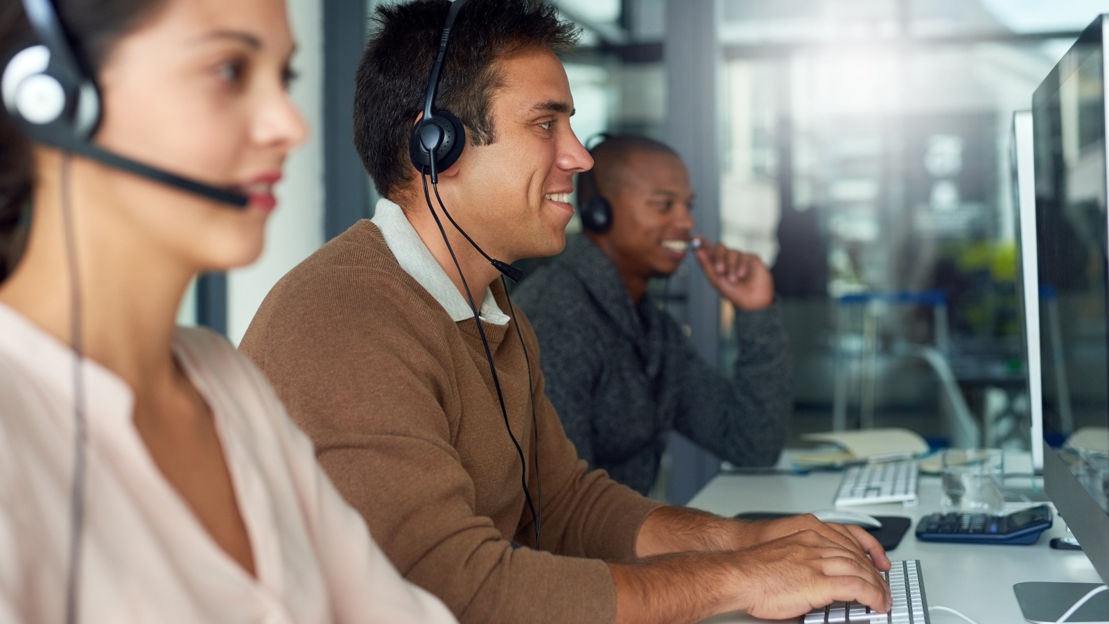 Call-centre-staff-on-phones-in-an-office-2
