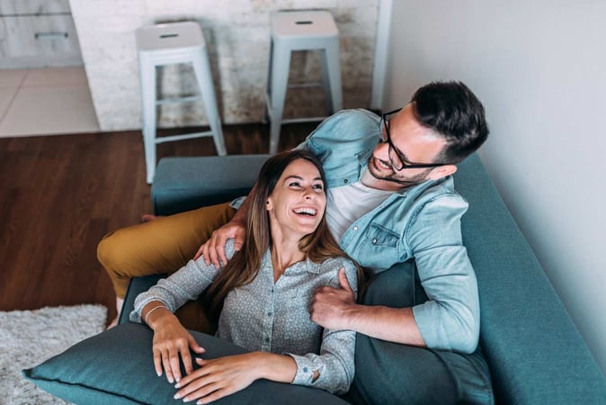 Happy couple at home