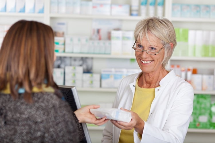 Patient collecting prescription