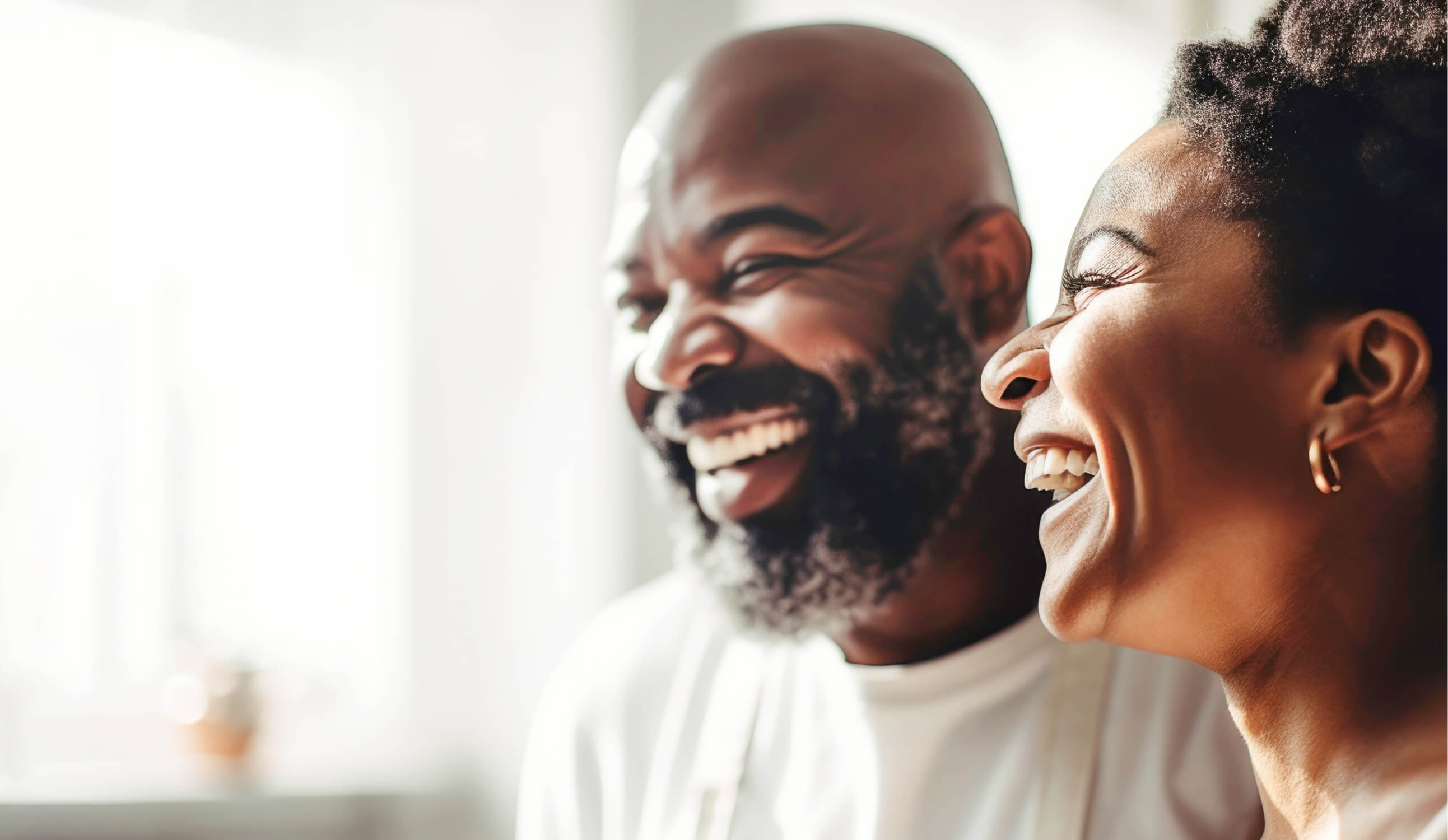 A couple smiling and laughing together (1)