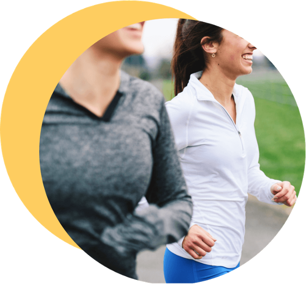 Two woman running together-1