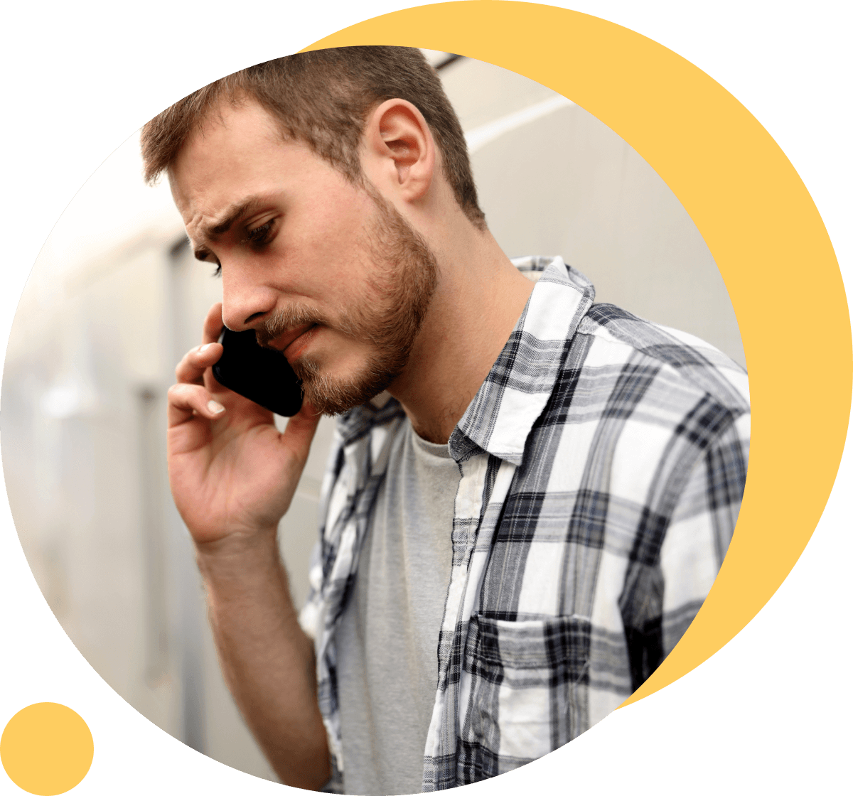 worried young man using mobile phone